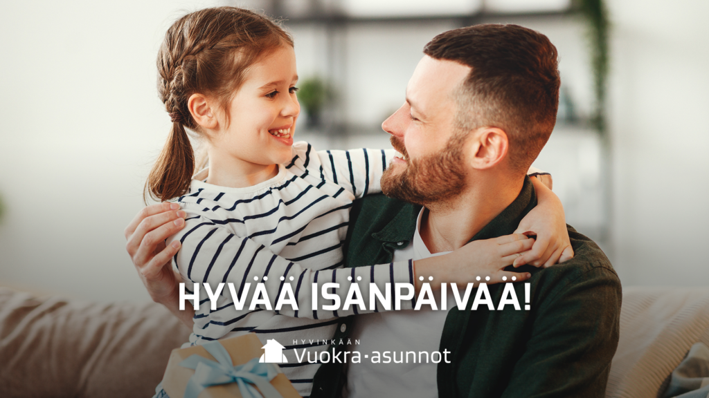 isä ja lapsi sylissä, kuvateksi hyvää isänpäivää